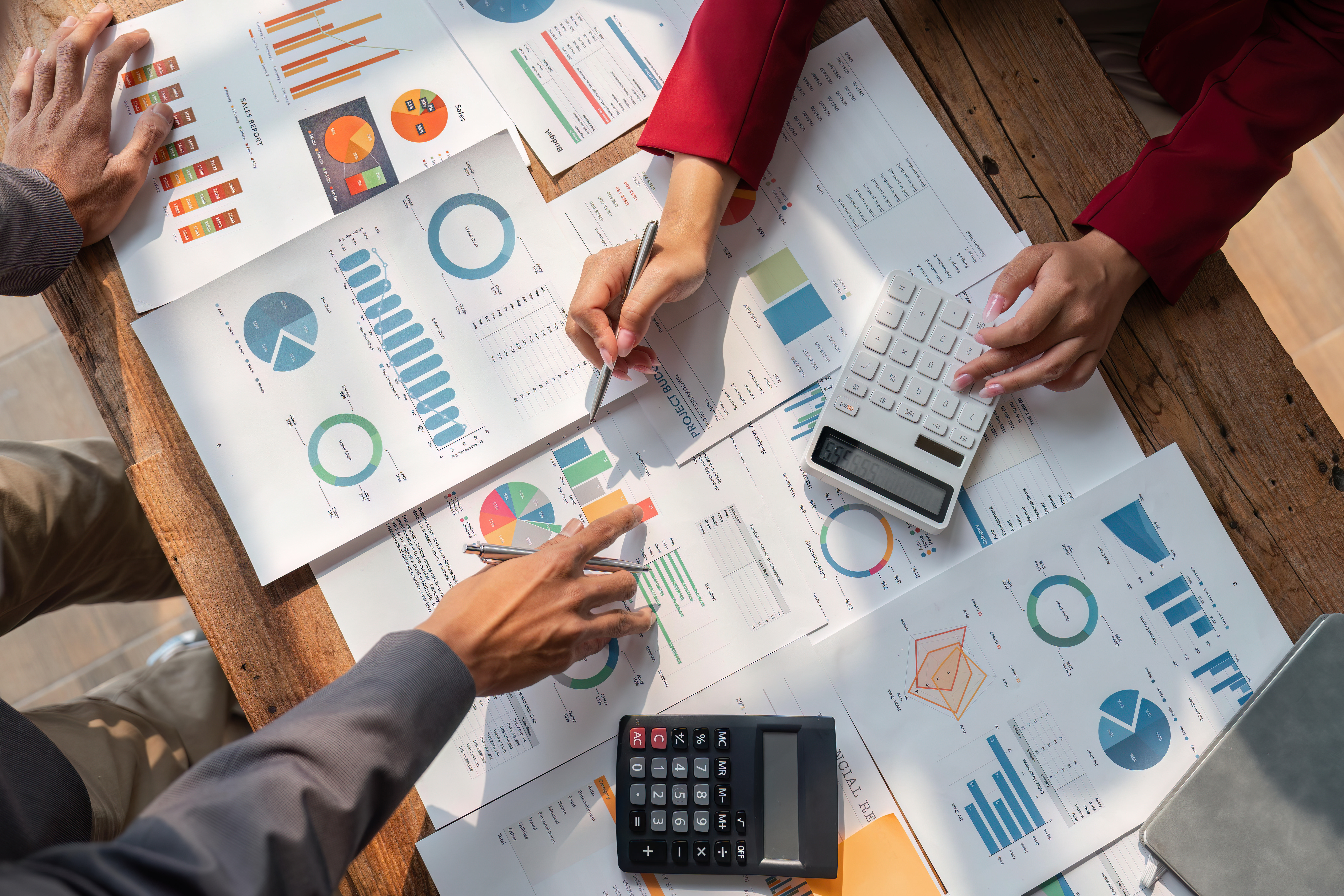 Financial planning documents and budgeting charts illustrating cashflow planning for long-term financial security and retirement preparation.