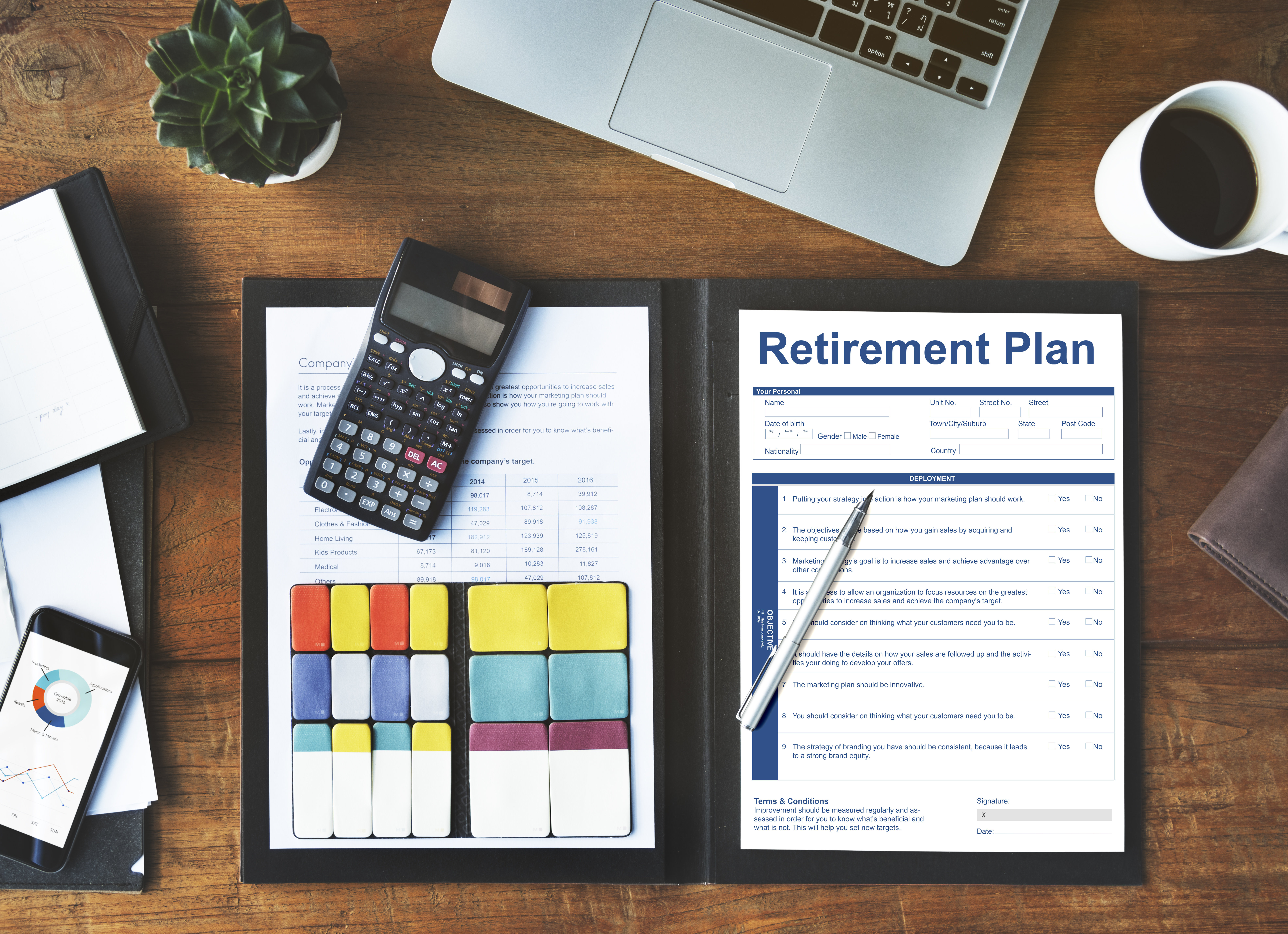 Retirement planning documents with a calculator, financial charts, and office desk setup illustrating cashflow planning for long-term wealth management and financial security.