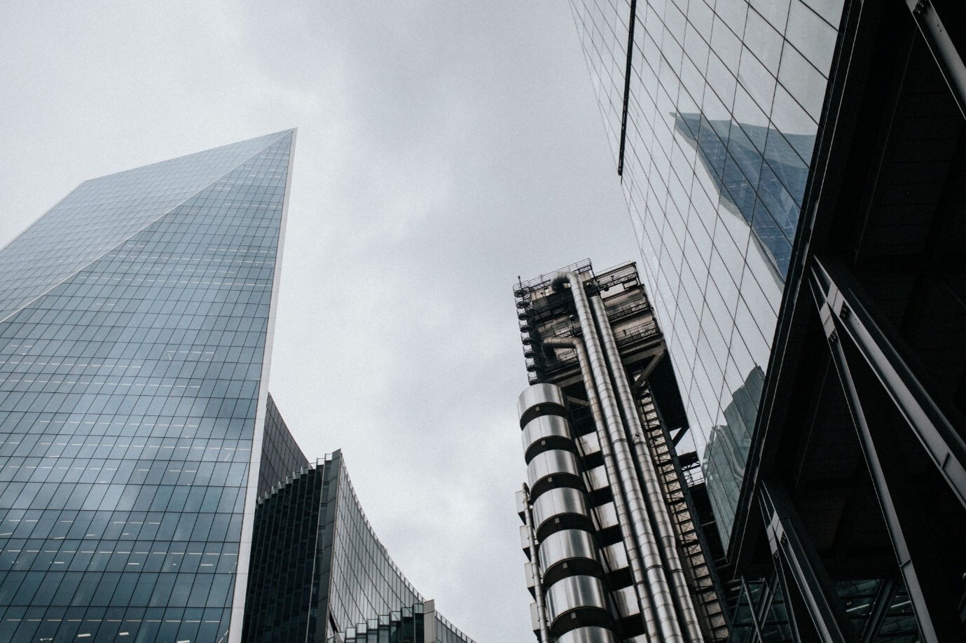 Modern commercial buildings representing businesses that may use business protection insurance to help safeguard their financial future.
